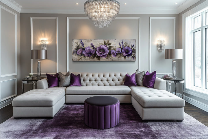 Panoramic framed canvas wall art featuring antique purple flowers above a modern sectional sofa.