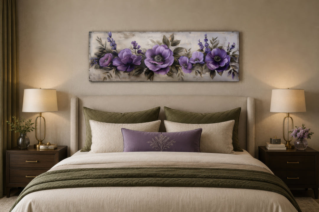 Panoramic framed canvas wall art featuring antique purple flowers displayed above a bed.