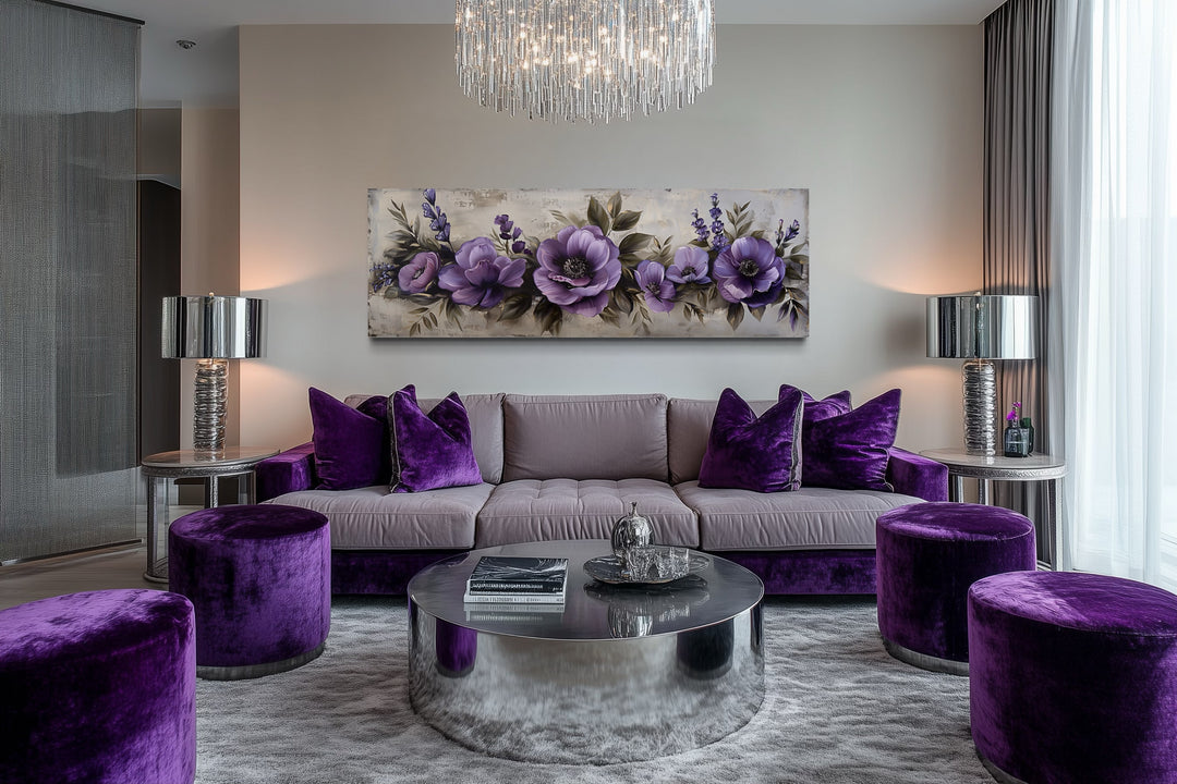 Panoramic framed canvas wall art featuring antique purple flowers above a modern living room sofa.