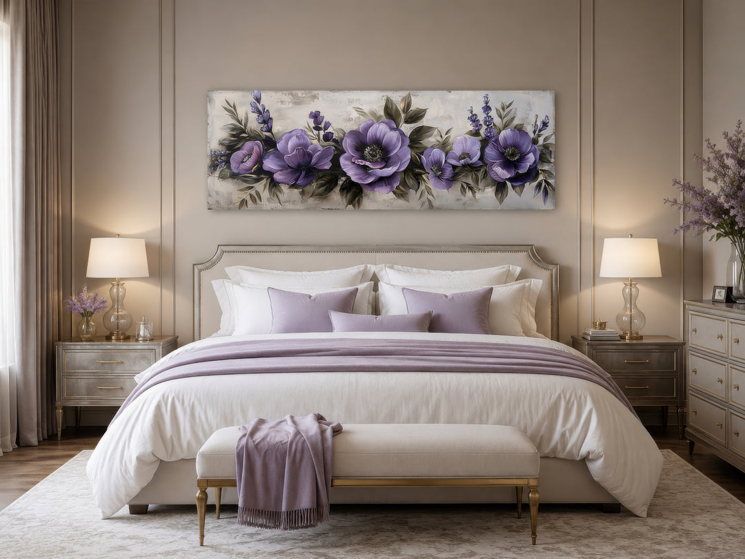 Panoramic framed canvas wall art featuring antique purple flowers displayed above a bed.