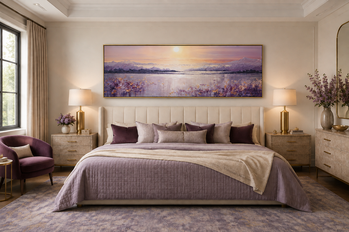 Long horizontal purple mountain lake sunset painting hanging above a bed in a modern bedroom.