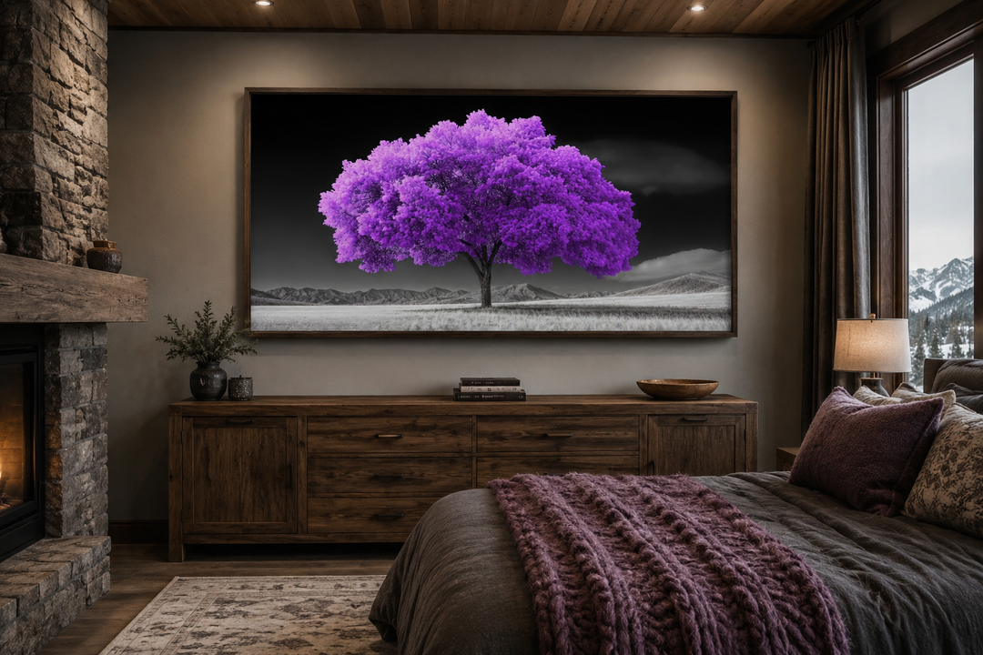 Framed canvas wall art of a vibrant purple tree on a black and white landscape background.