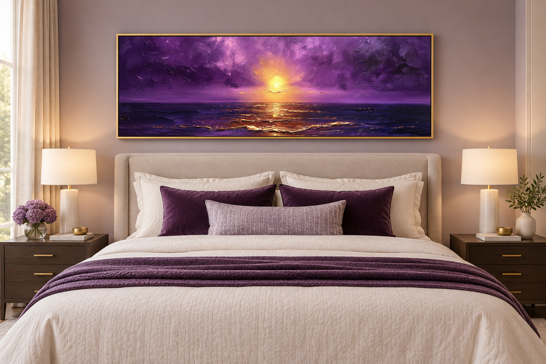 Purple and gold ocean sunset horizontal wall art hanging above a bed in a modern bedroom.