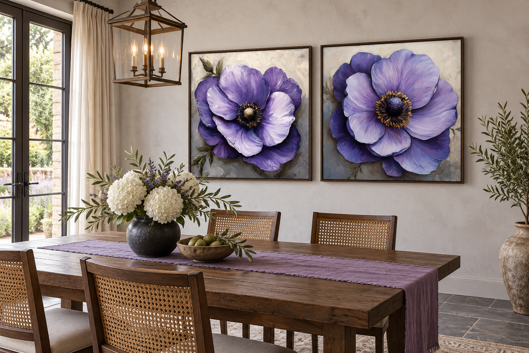 Set of 2 large purple flower framed canvas wall art panels above a wooden dining table.