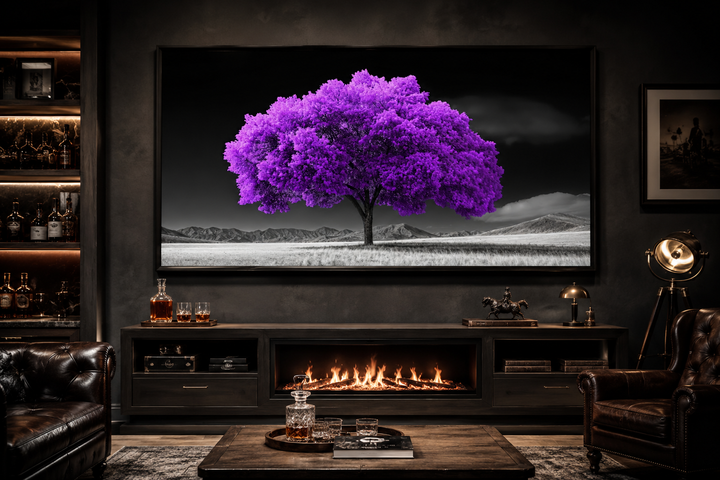 Framed canvas wall art of a vibrant purple tree against a black and white landscape background.