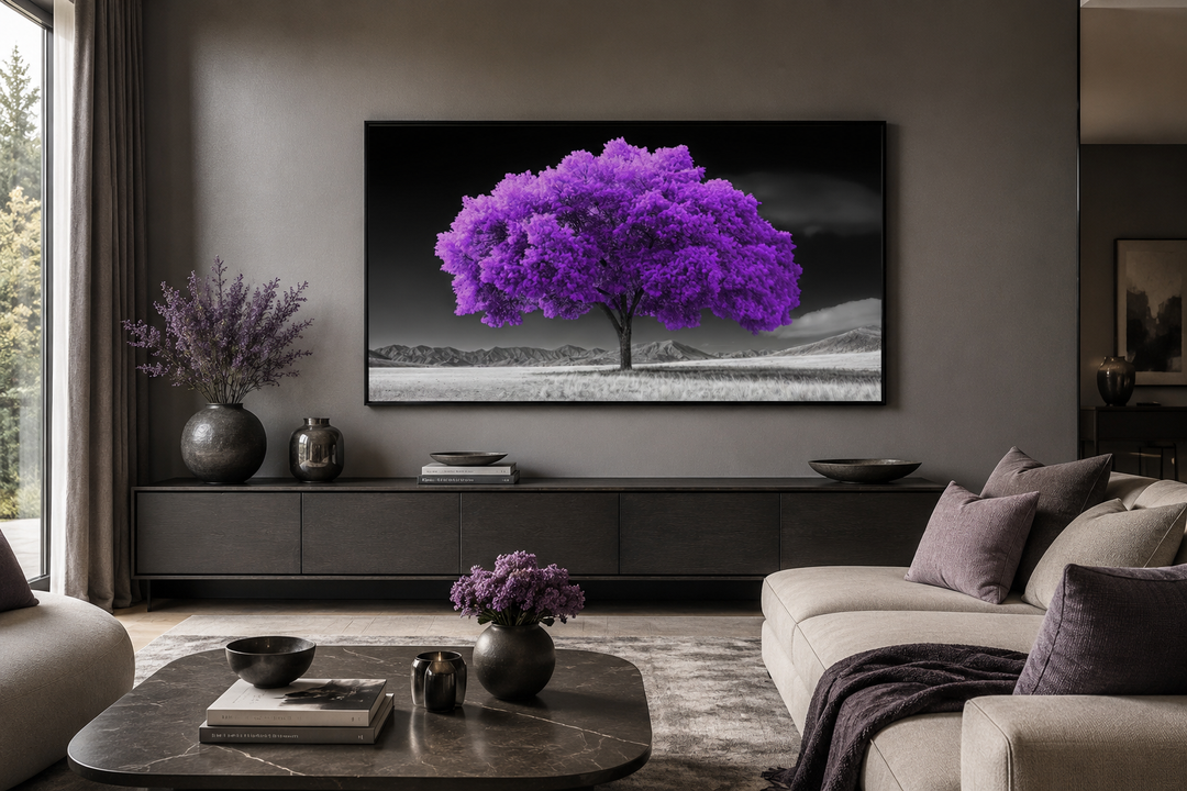 Framed canvas wall art of a vibrant purple tree against a black and white landscape background.