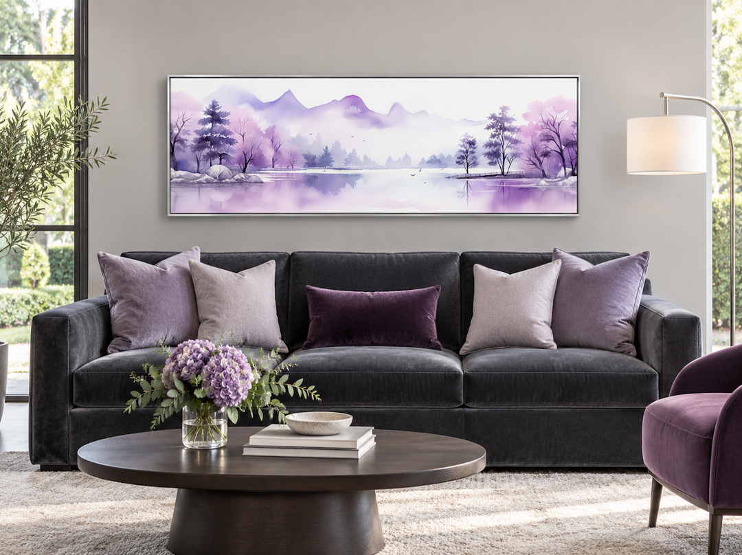 Purple mountains lake horizontal wall art above a dark grey sofa in a modern living room.