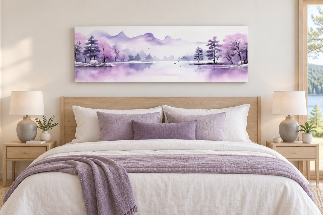Purple mountains lake watercolor canvas art hanging above a bed in a serene bedroom.