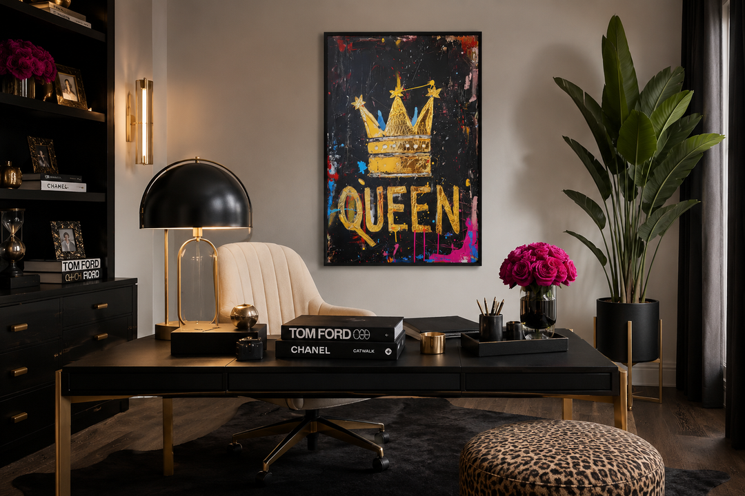 Queen wall art with a gold crown and word Queen on a black canvas in a modern office setting.