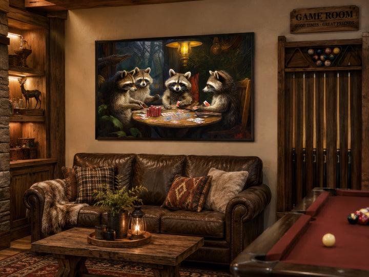 Raccoons playing poker framed canvas wall art hanging above a leather sofa in a rustic game room.