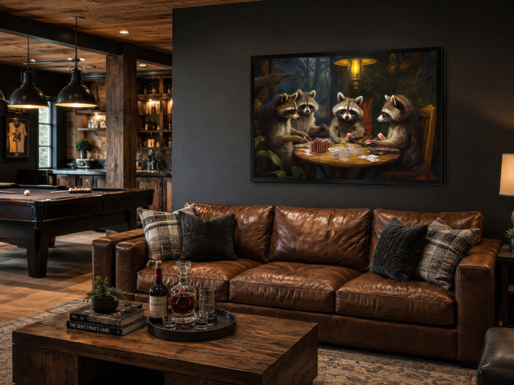 Raccoons playing poker framed canvas wall art hanging above a leather sofa in a rustic man cave.