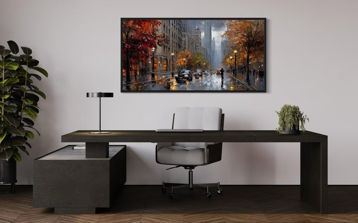 Rainy Chicago Street Framed Canvas Wall Art in an impressionistic style above a modern office desk.