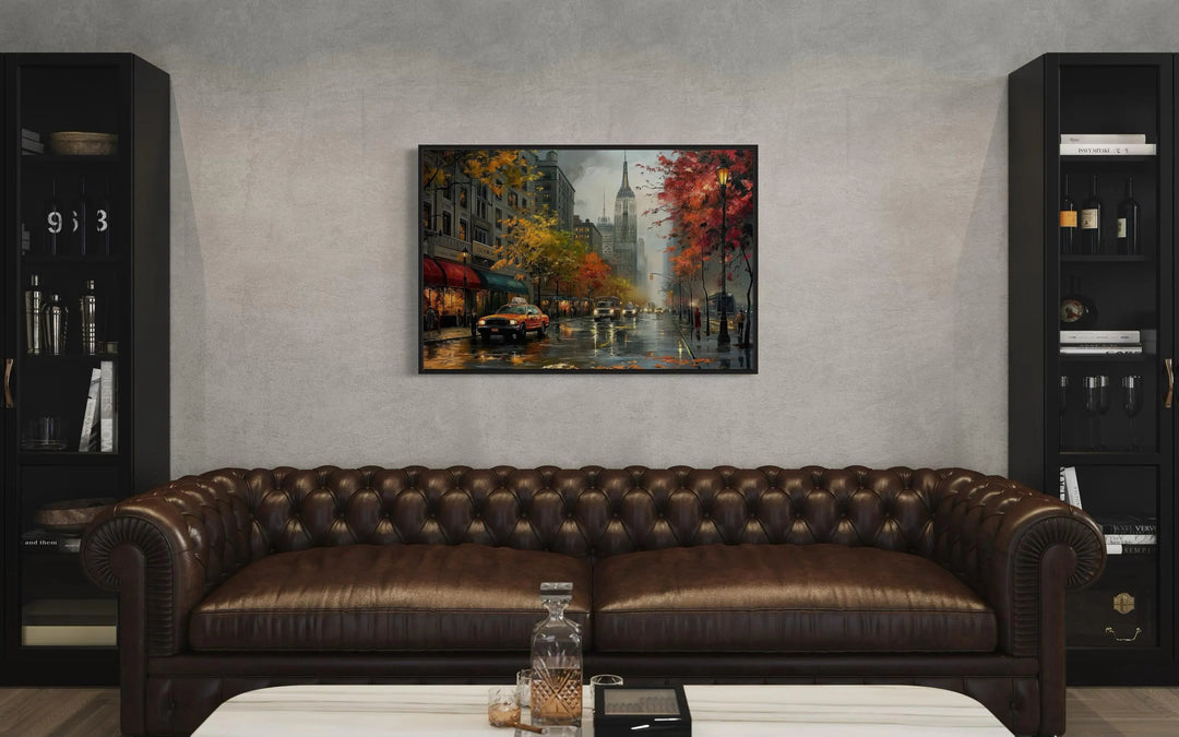 Rainy New York City Street Framed Canvas Wall Art hanging above a brown leather sofa.