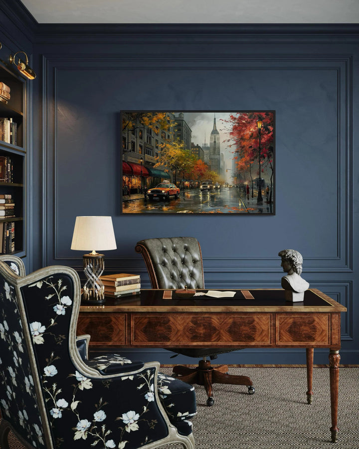 Rainy New York City street framed canvas wall art hanging in a dark blue home office.