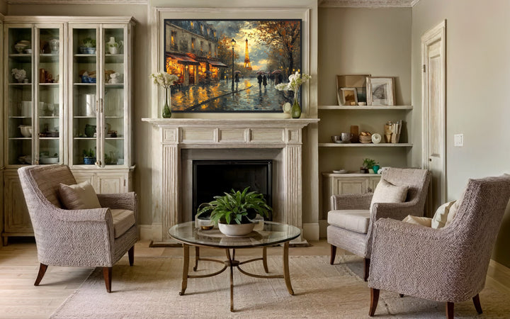 Rainy Paris street scene with the Eiffel Tower on a framed canvas above a fireplace.