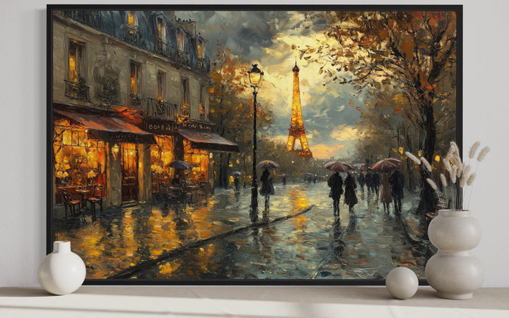 Impressionist framed canvas art of a rainy Paris street at night with the glowing Eiffel Tower.