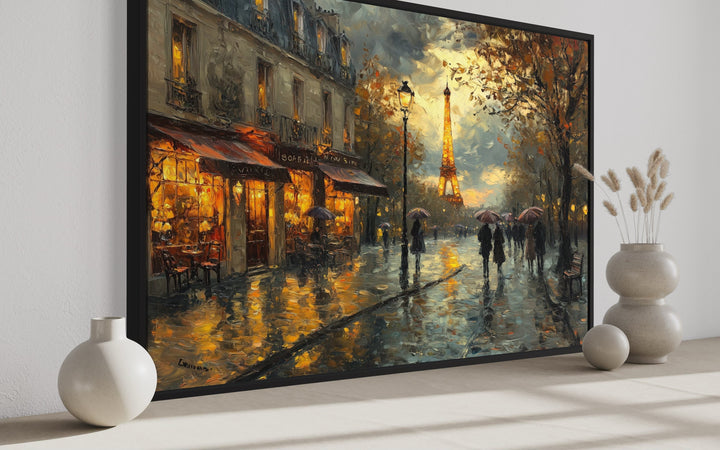 Framed impressionist canvas art of a rainy Paris street at night with the Eiffel Tower.