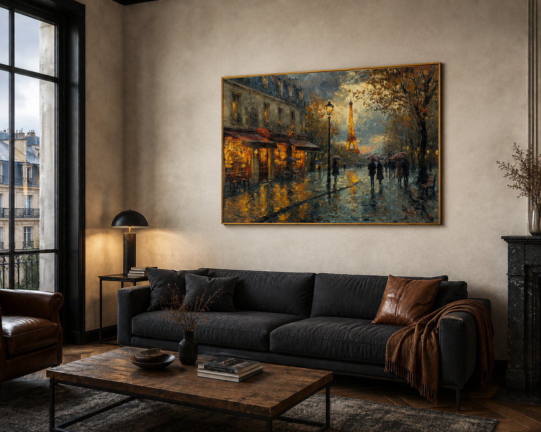 Rainy Paris street with Eiffel Tower romantic framed canvas wall art above a dark sofa in a room.