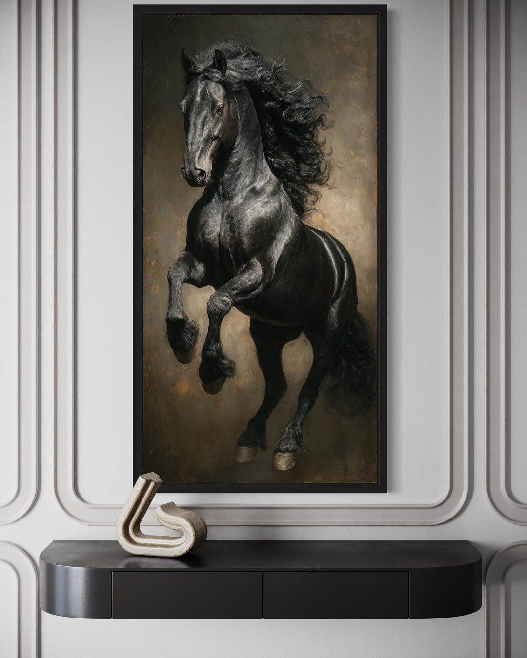 Rearing black stallion framed canvas wall art in a traditional oil painting style on a white wall.