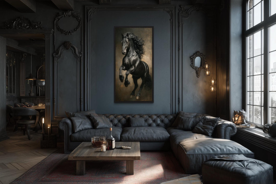 Rearing black stallion framed canvas wall art centered on a dark paneled wall above a leather sofa.