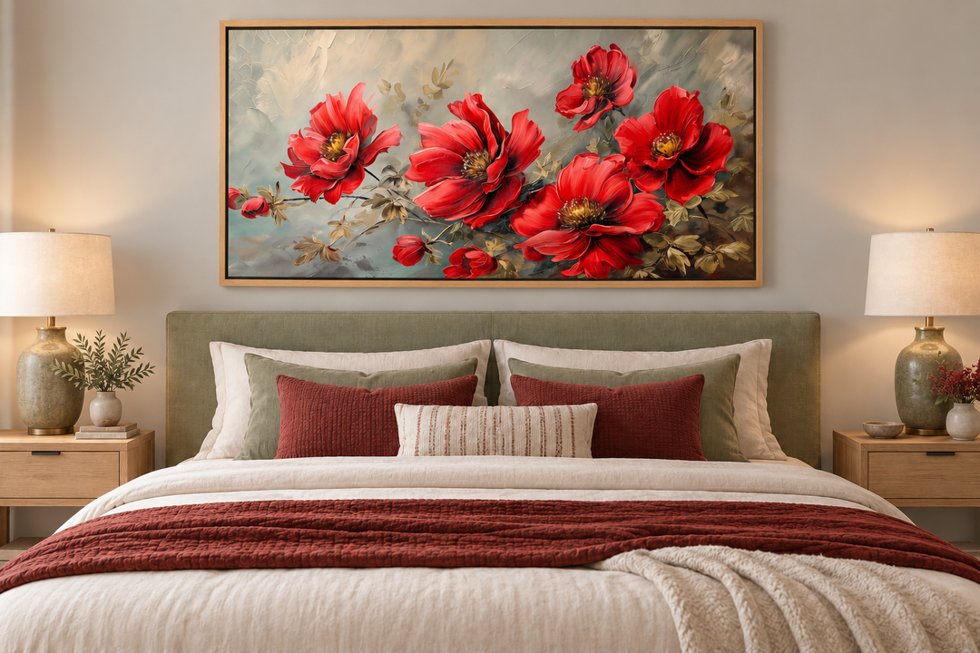Red abstract flowers framed canvas wall art hanging above a bed with sage green headboard.