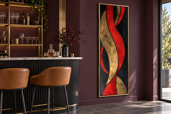 Tall vertical abstract canvas with red, gold, and black flowing geometric shapes in a gold frame.
