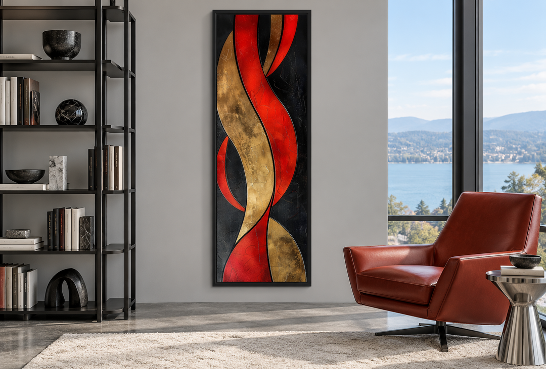 Tall vertical framed canvas with abstract red, gold, and black geometric waves in a modern room.