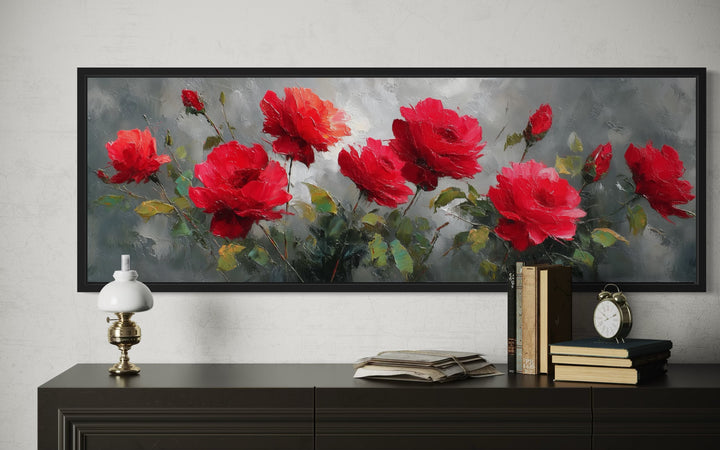 Red and grey horizontal roses framed canvas wall art above a dark console table.
