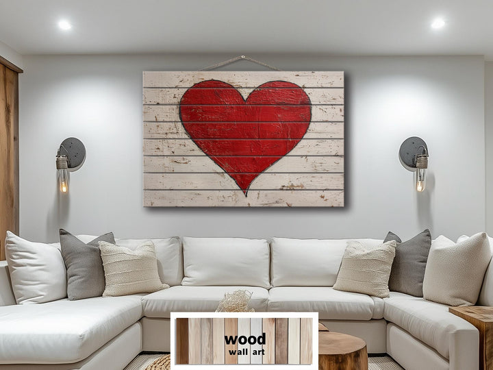 Rustic red heart painted on whitewashed wood planks for farmhouse wall decor.