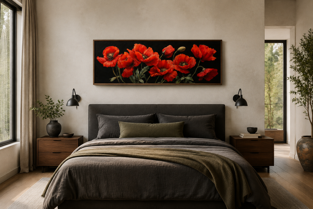 Long horizontal framed canvas wall art featuring red poppies on a black background above a bed.