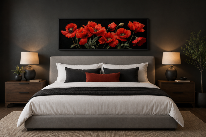 Long horizontal framed canvas wall art featuring red poppies on a black background above a bed.
