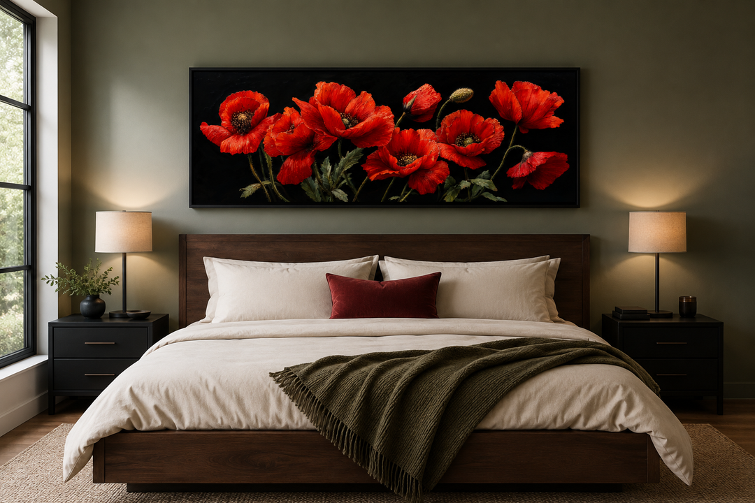 Long horizontal framed canvas wall art featuring red poppies on a black background above a bed.