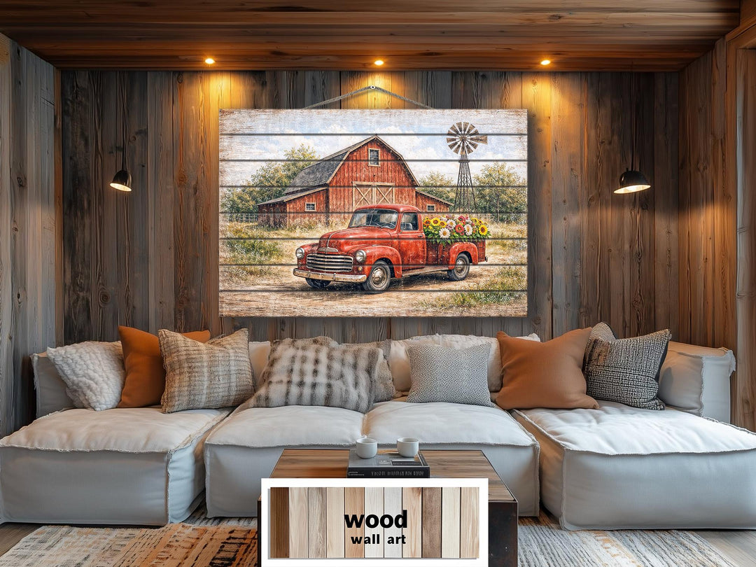 Red truck with flowers and barn scene printed on horizontal wood planks for farmhouse wall decor.