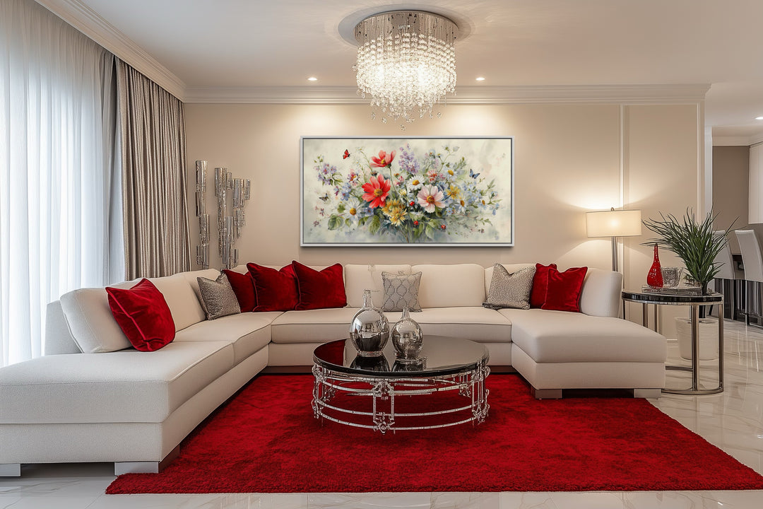 Red wildflowers bouquet watercolor botanical framed canvas wall art above a white sectional sofa.