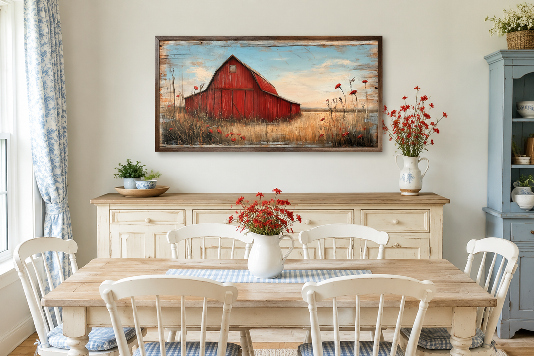 Old red barn on weathered wood canvas wall art hanging above a sideboard in a farmhouse dining room.