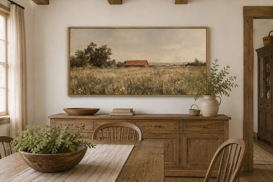Red barn in a wildflower field landscape canvas wall art in a neutral farmhouse dining room.