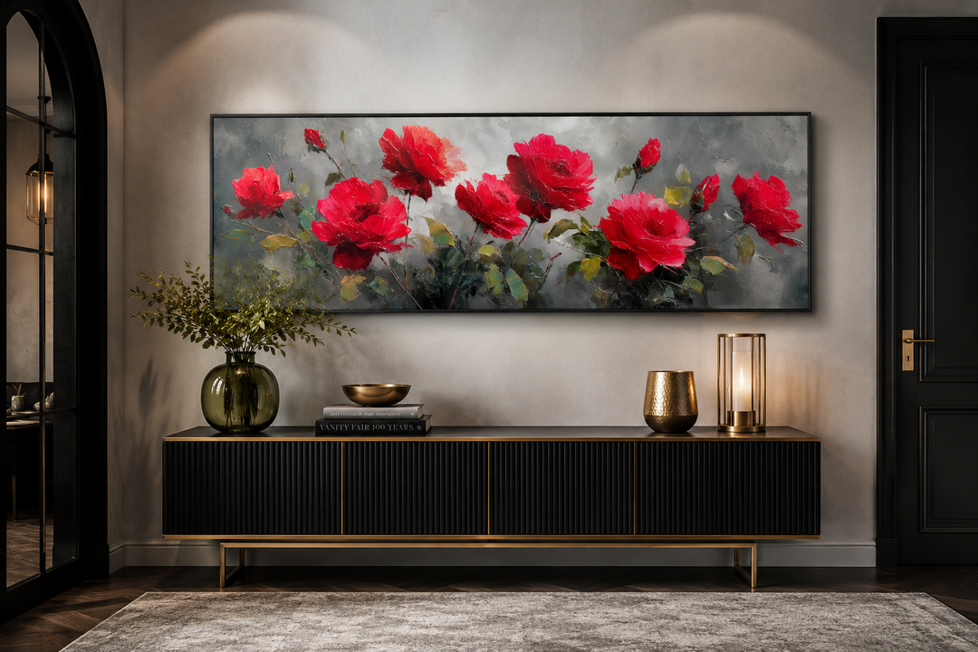 Red and grey horizontal roses framed canvas wall art above a black and gold sideboard.
