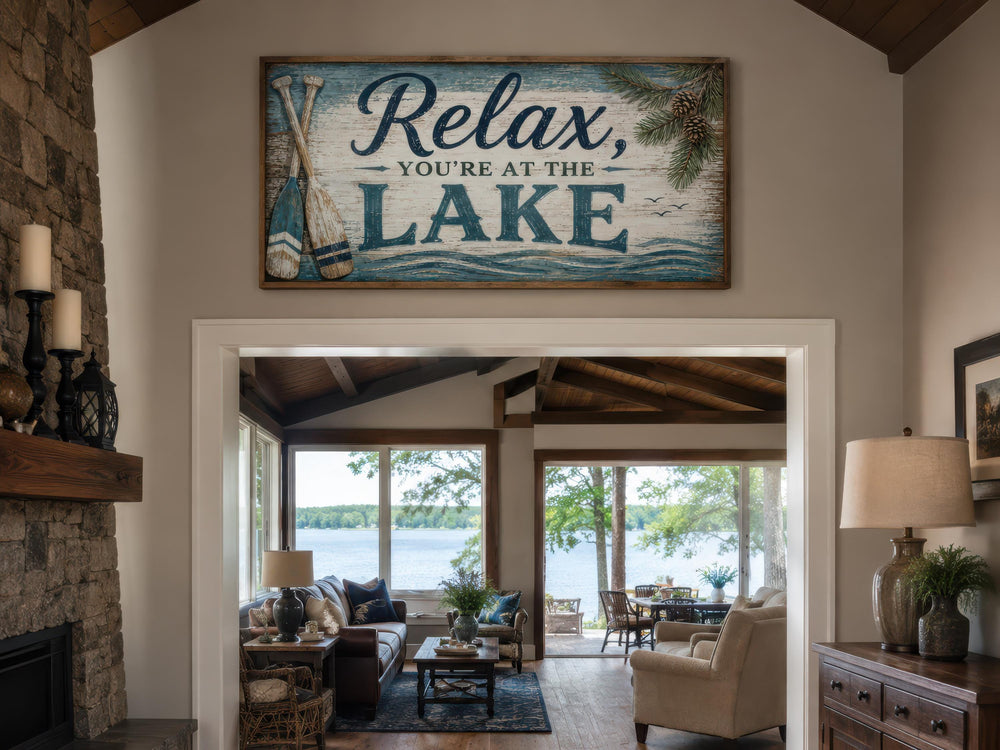 Rustic 'Relax, You're At The Lake' canvas sign hanging above a doorway in a cozy lake house.
