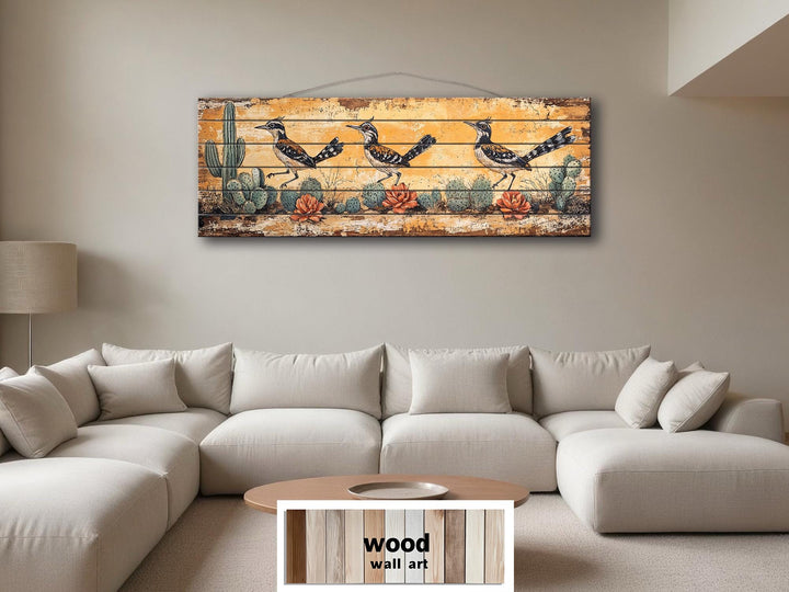 Horizontal wood wall art featuring three roadrunners in a desert scene with cacti.