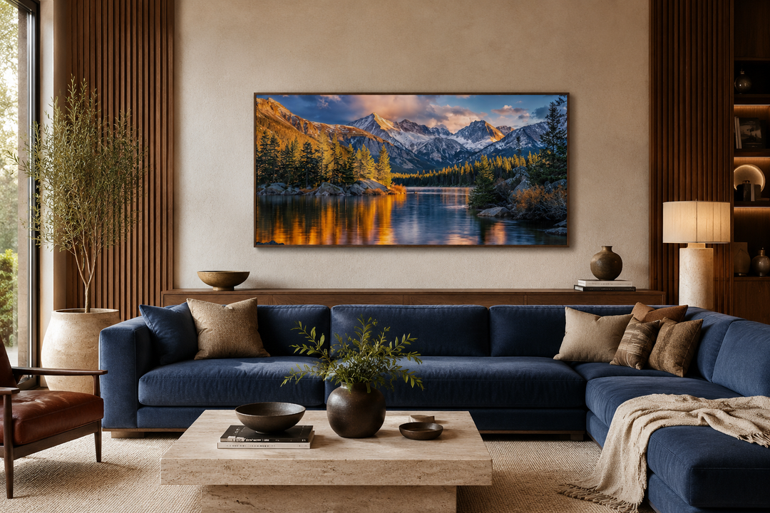 Rocky Mountain National Park framed canvas wall art above a blue sofa in a modern living room.
