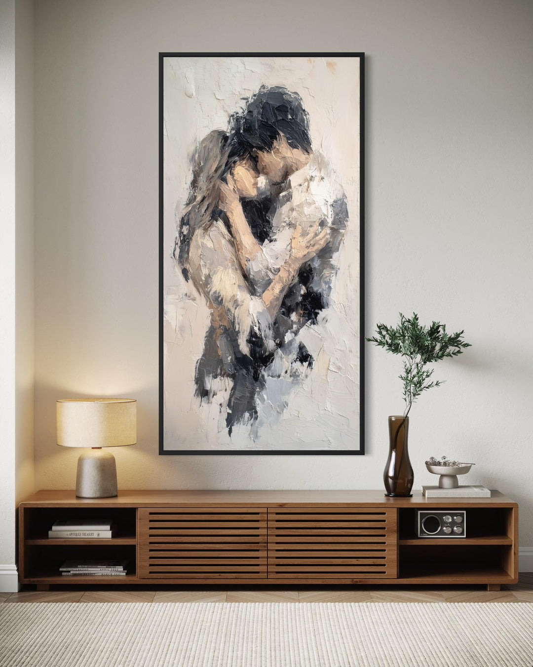 A tall vertical canvas featuring an abstract neutral painting of a romantic couple in an embrace.