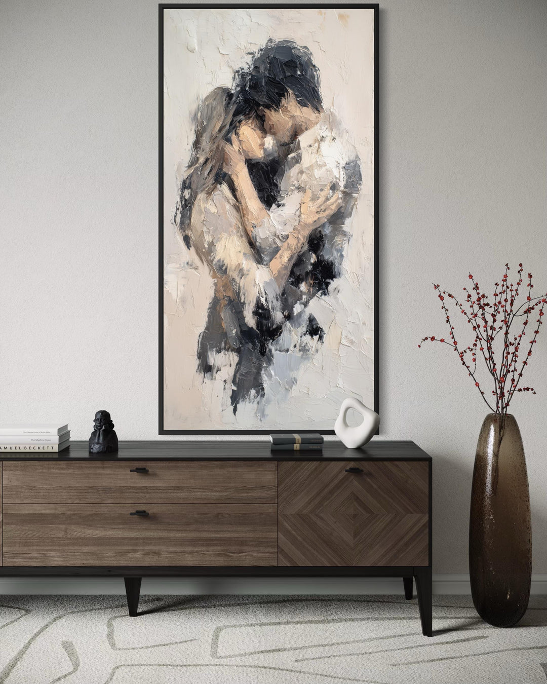 A tall vertical canvas featuring an abstract, neutral-toned painting of a couple in a close embrace.