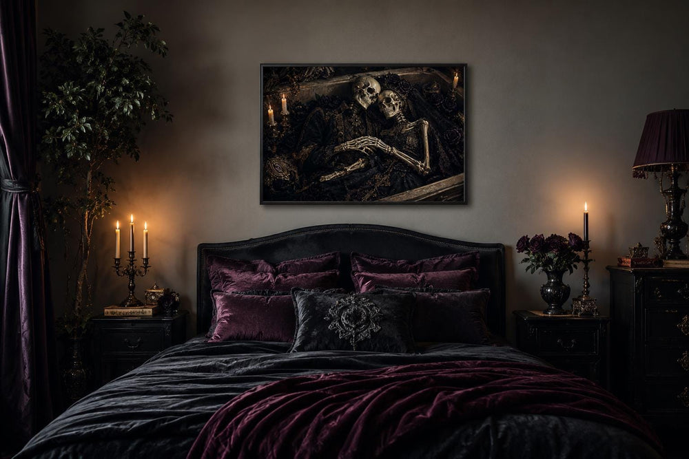 Romantic Gothic skeleton couple artwork in an ornate coffin canvas hanging above a dark velvet bed.