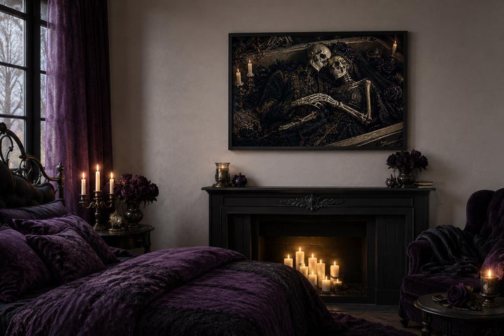 Gothic canvas art of a skeleton couple embracing in a coffin, hung above a fireplace in a bedroom.