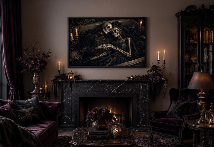 Gothic canvas art of an embracing skeleton couple in an ornate coffin above a black marble fireplace.
