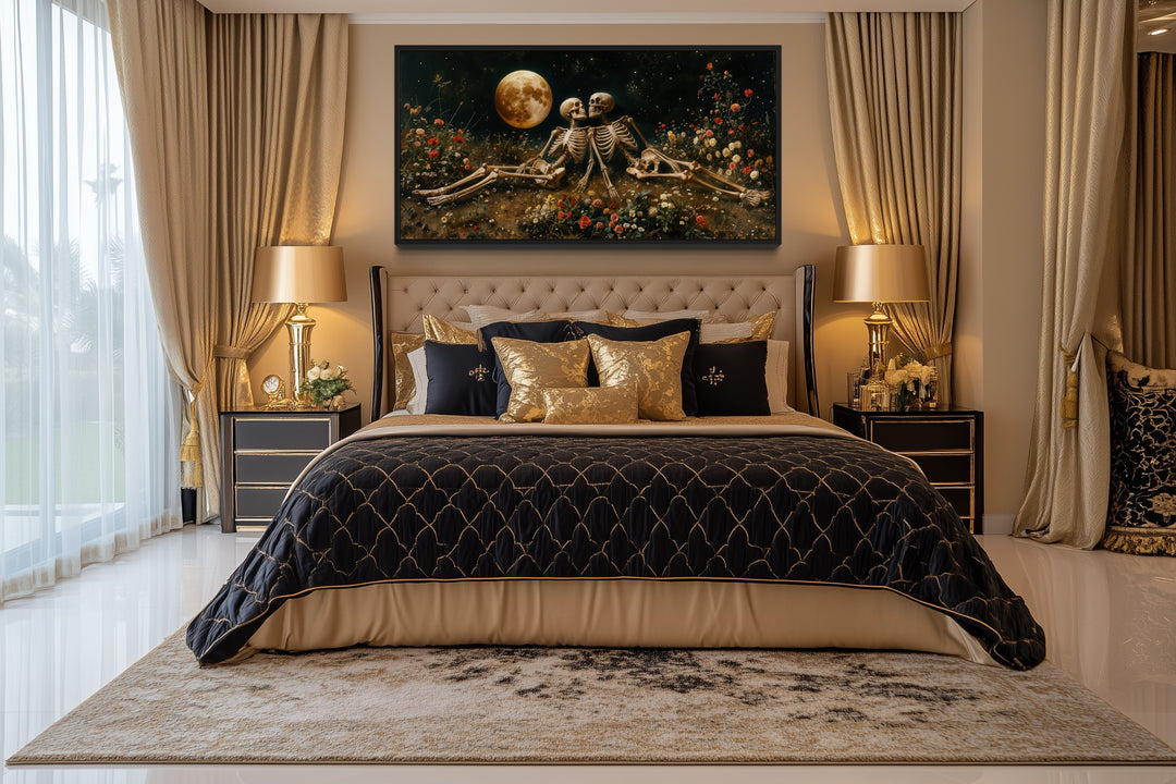 Romantic Gothic wall art of two skeletons in a flower meadow under a full moon above a bed.
