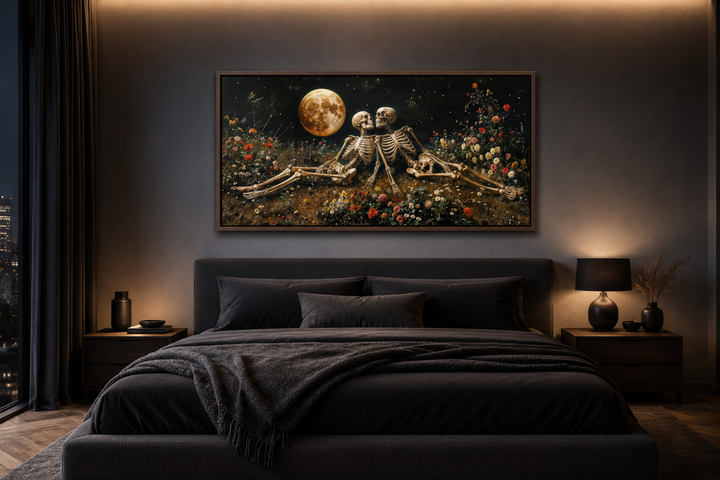 Romantic gothic wall art of two skeletons in a flower meadow under a full moon above a dark bed.