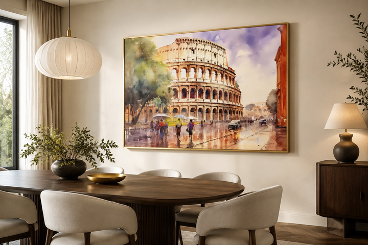 Framed watercolor canvas art of the Colosseum in Rome hanging in a modern dining room.