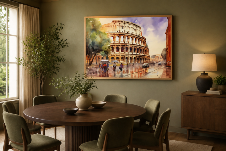 Framed watercolor canvas art of the Rome Colosseum on a green wall in a modern dining room.