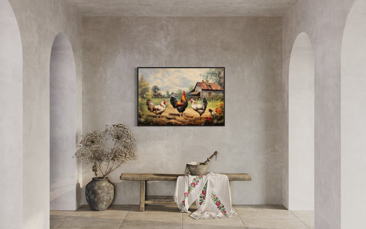Framed canvas wall art of roosters and chickens in a farmyard, hung in a rustic farmhouse interior.